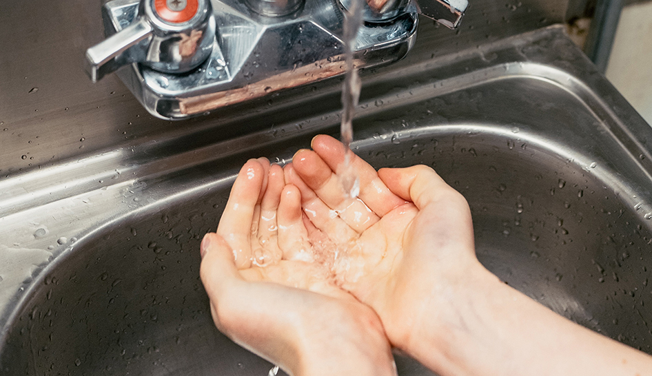 Coronavirus handwashing silver sink stock column