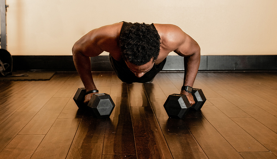 Personal training man pushup Stock image column